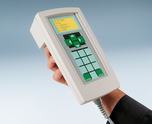 Handheld enclosure for control systems in production and for outdoors